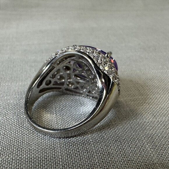 Tanzanite and CZ stones Silver Halo Ring